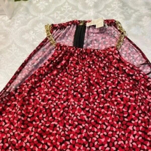 Micheal Kore’s woman top M